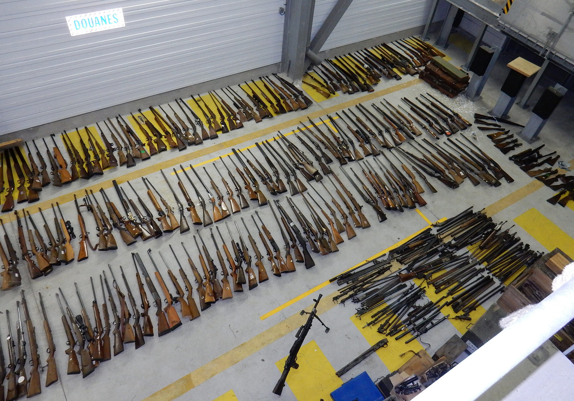 French customs agents find stash of weapons in sports shop