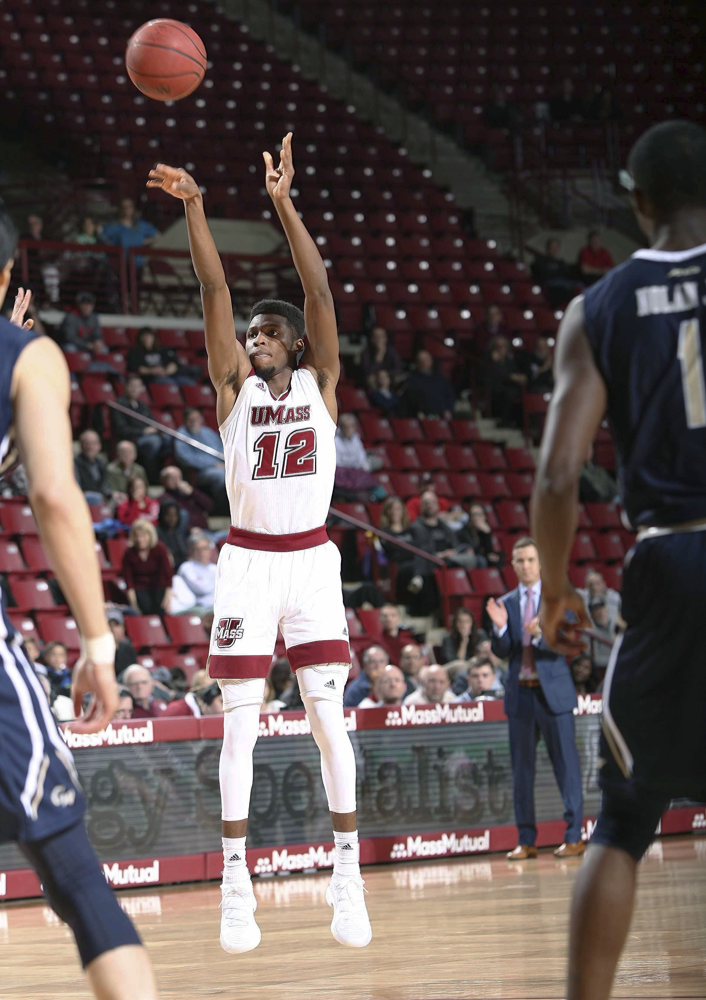 George Washington downs UMass 83-72