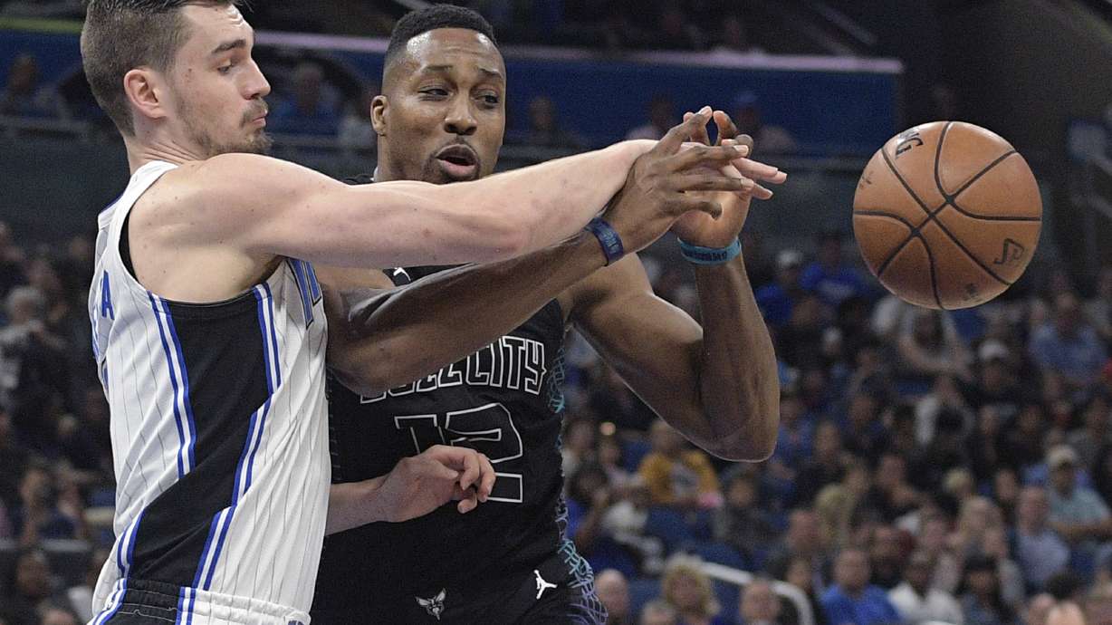 Howard shines as Hornets top Magic 104-102