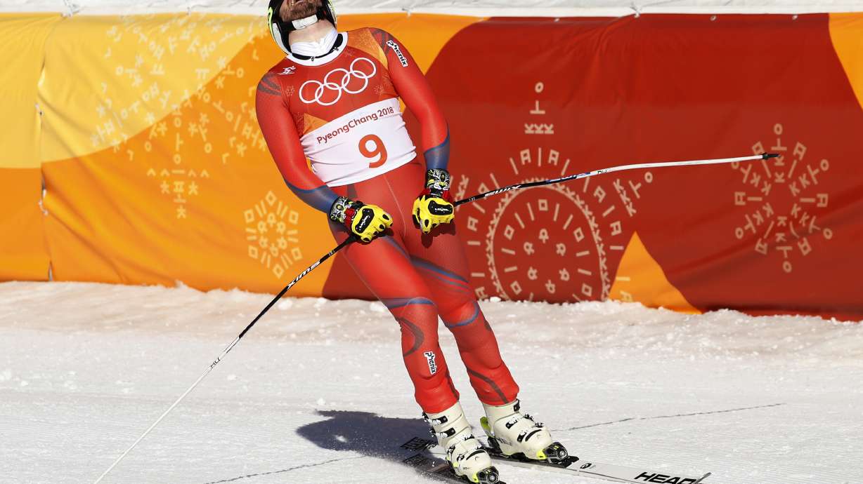 Svindal wins Olympic downhill to become oldest Alpine champ