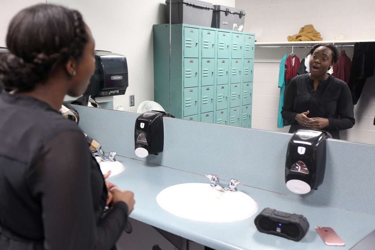 Christine Martial, a senior at the American International School of Utah, prepares to go before judges during the semifinals of the 2018 Sterling Scholar Awards at Copper Hills High School in West Jordan on Thursday, Feb. 15, 2018. Students from the central area of the Wasatch Front competed in 14 categories Thursday at three different schools. (Photo: Jacob Wiegand, KSL)