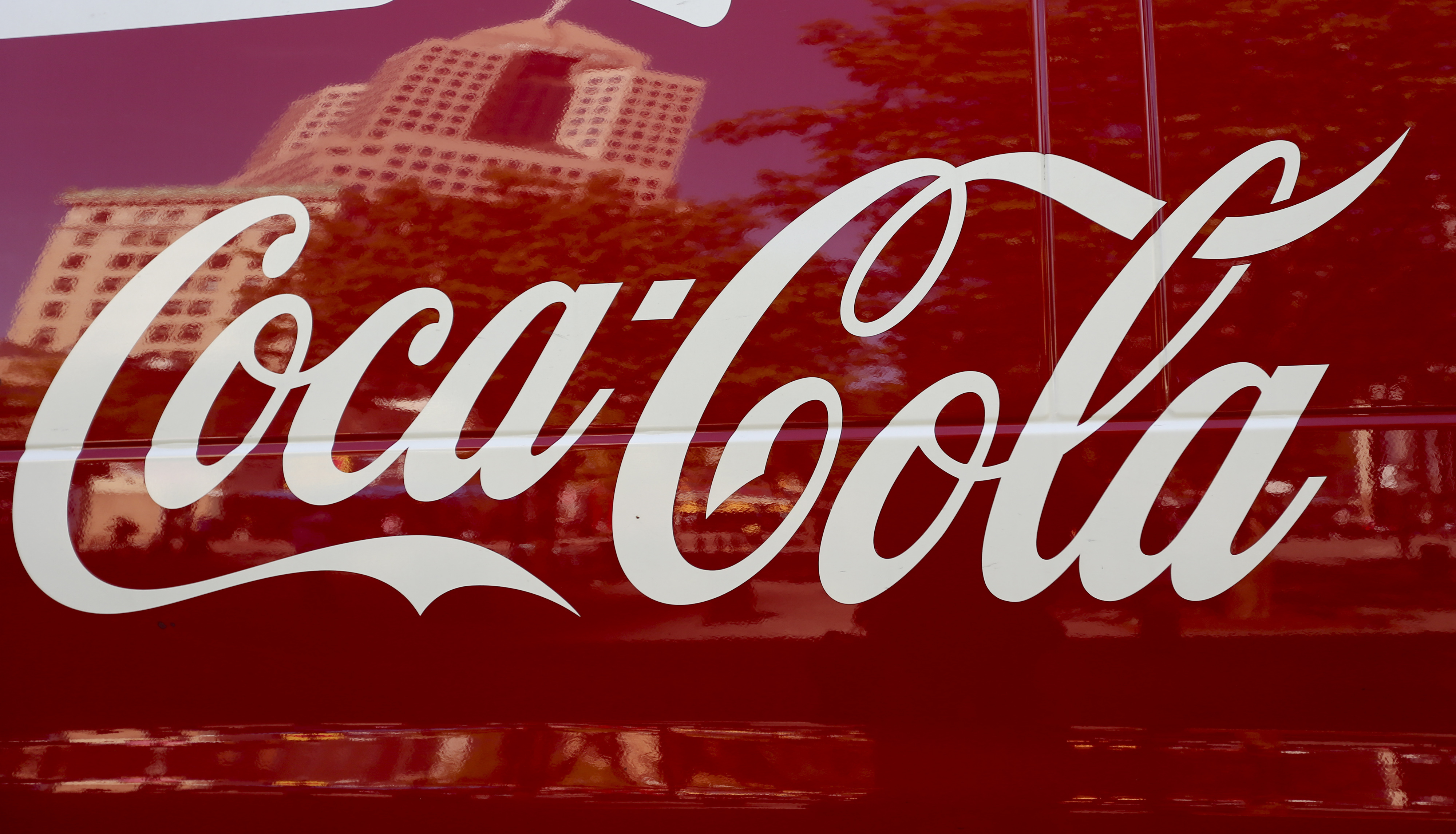 Coke sales fall as company shifts gears, sheds bottling biz