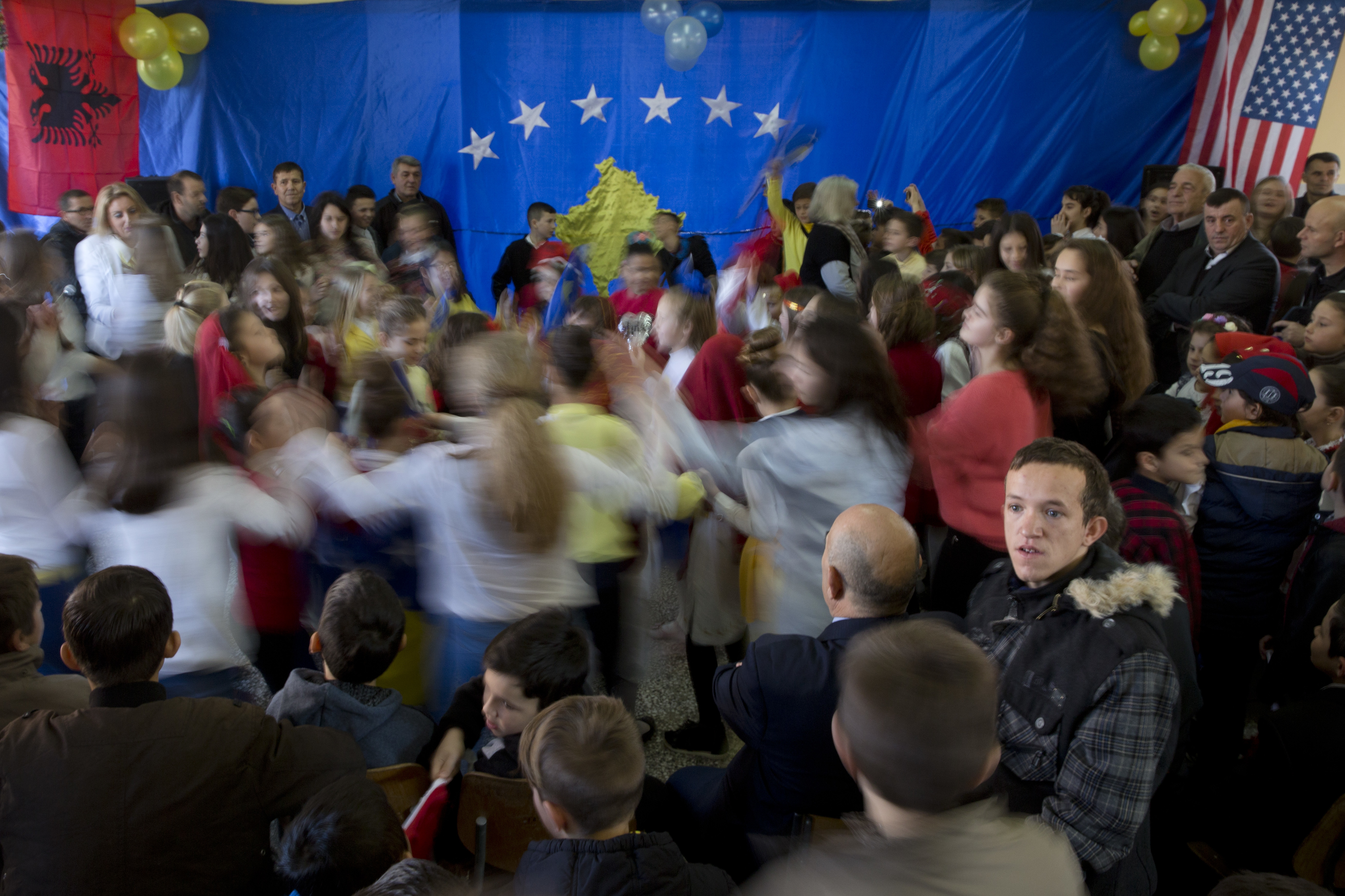 Students celebrate 1st child born in an independent Kosovo