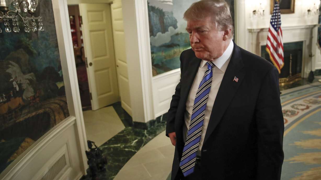 The Latest: Trump praises Fla. law enforcement members