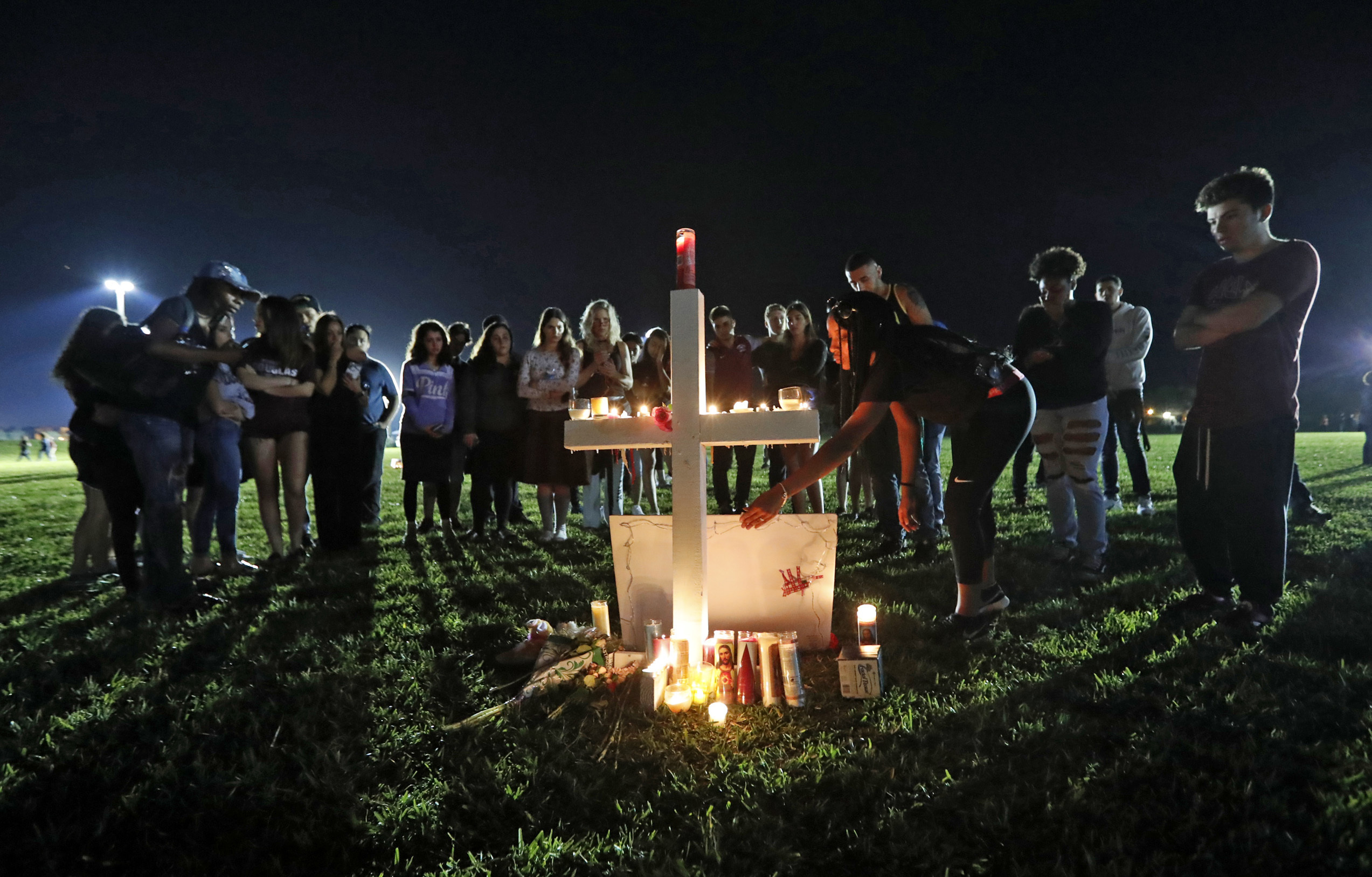 The Latest: Trump visits hospital, meets shooting survivors