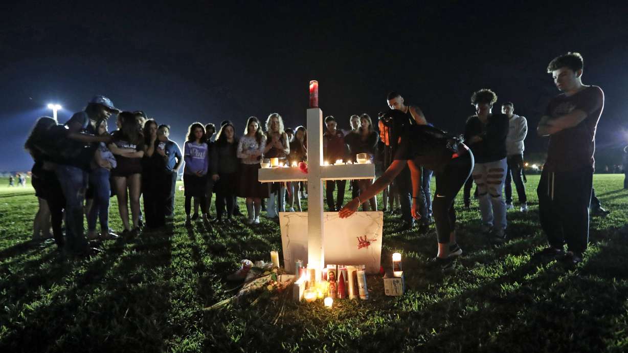 The Latest: Trump visits hospital, meets shooting survivors