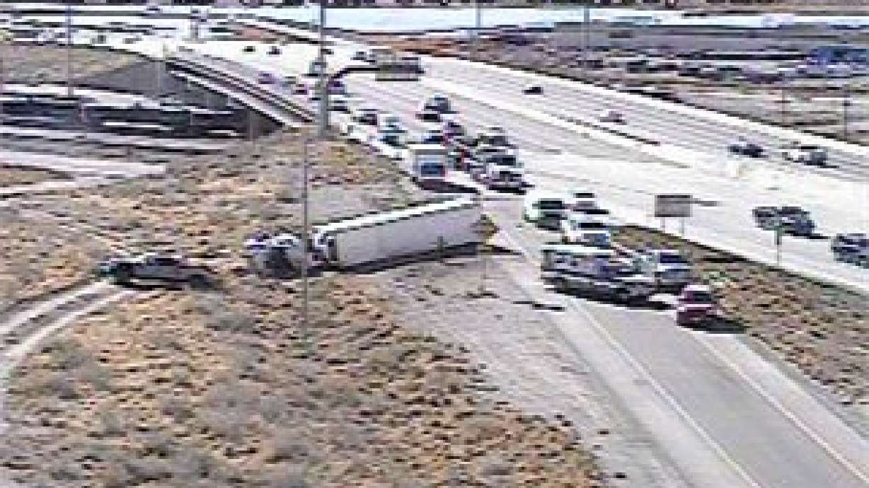 Semitrailer rollover temporarily closes I-15 ramp in Salt Lake City
