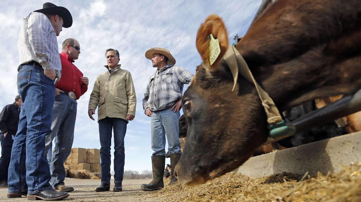 The Latest: Romney talks gun violence in Utah GOP speech