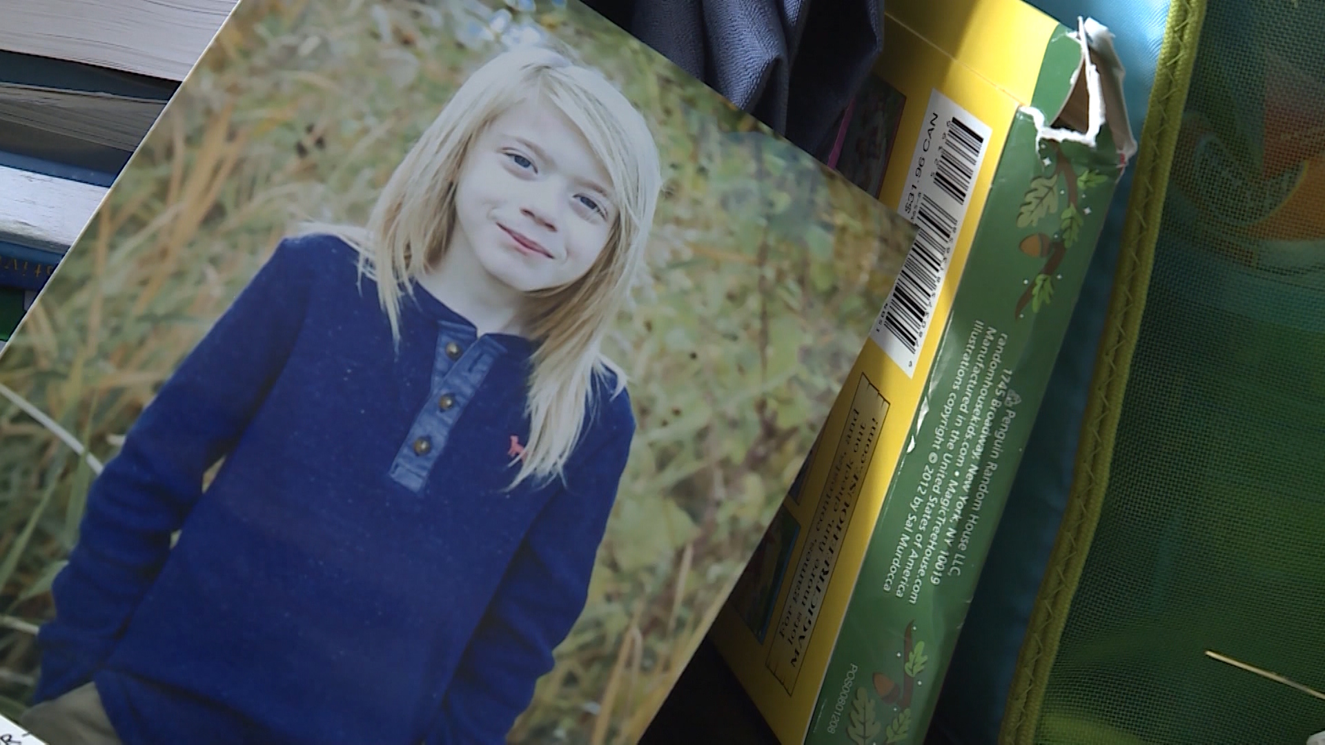After growing his hair out for over two years, 8-year-old Tate Morgan cut his locks on Feb. 16, 2018, so his hair could benefit children with cancer. (KSL TV)