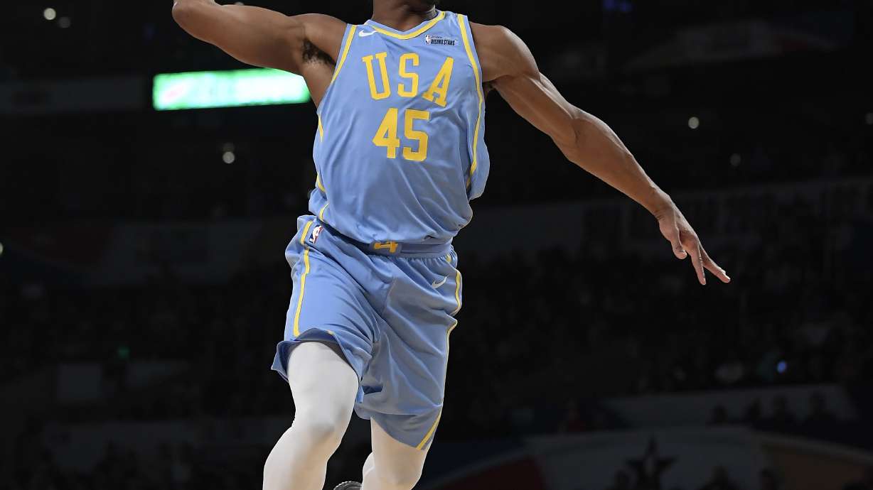 Mitchell soars to dunk title, Booker sets 3-point record