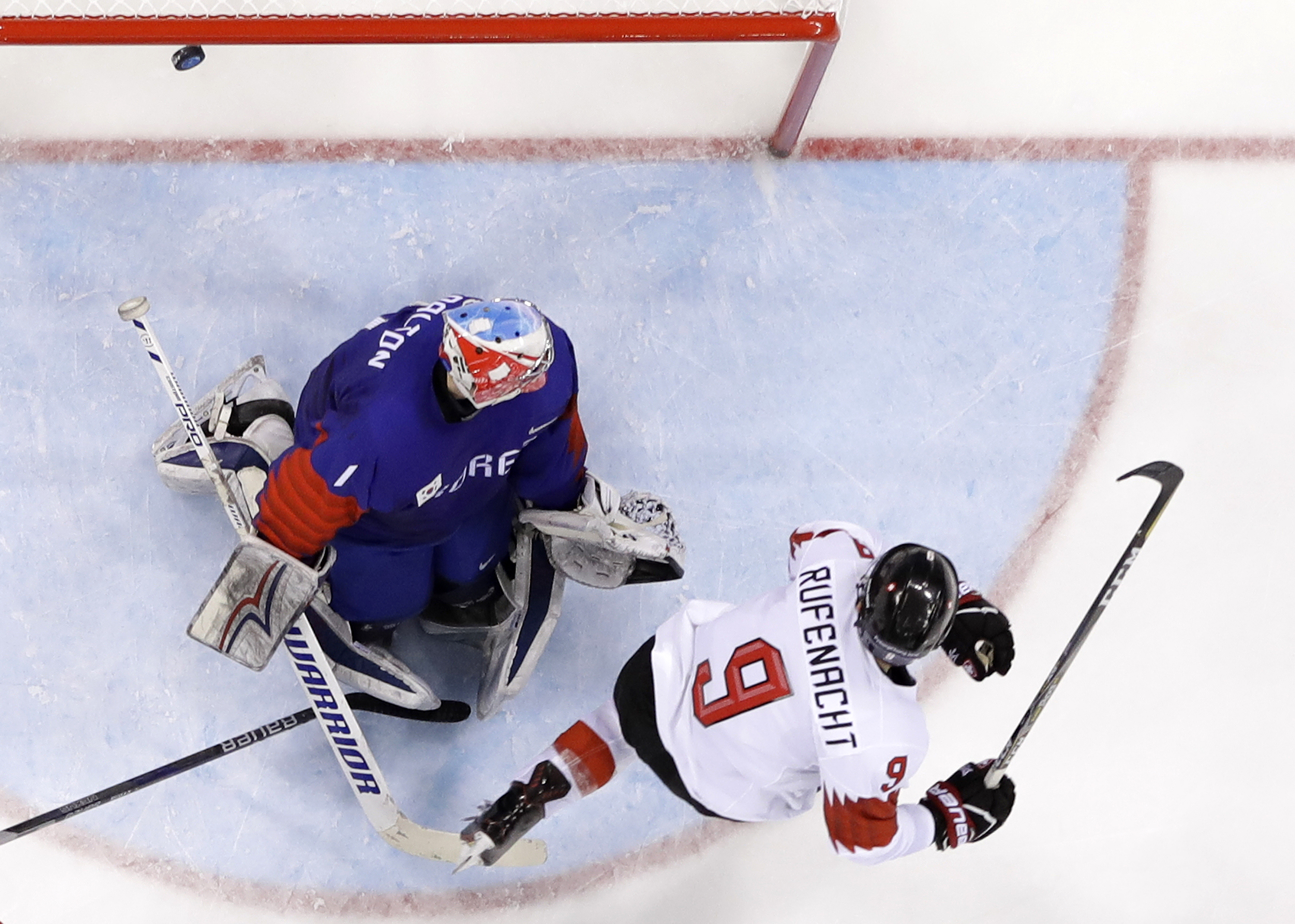 Suter has hat trick as Switzerland blanks South Korea 8-0