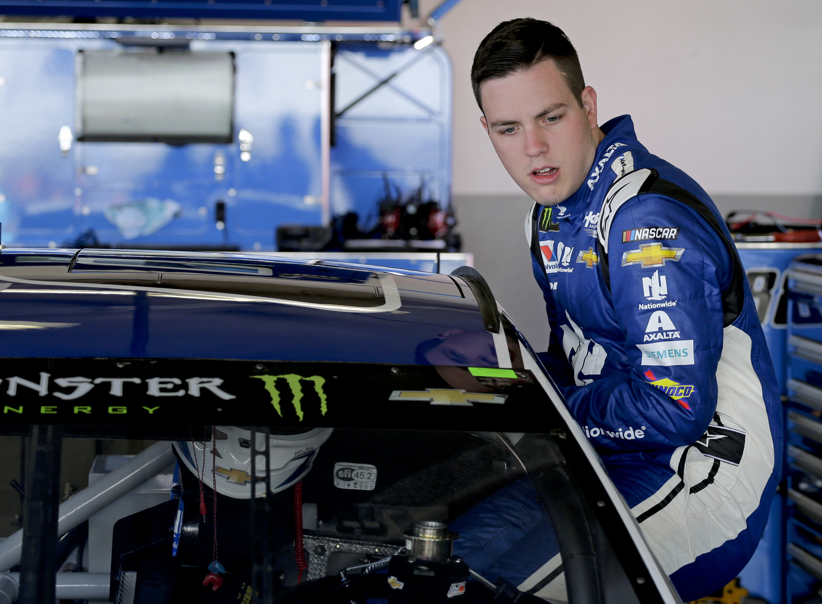 The Latest: Wallace overcome with emotion after historic run