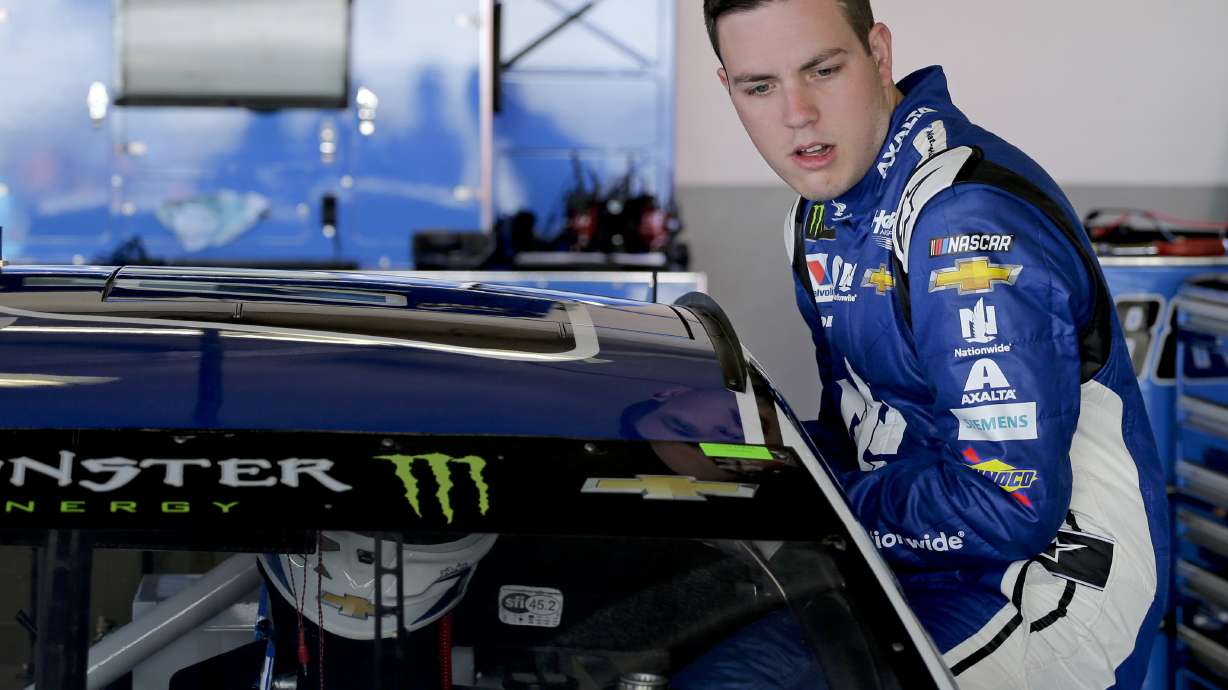 The Latest: Wallace overcome with emotion after historic run