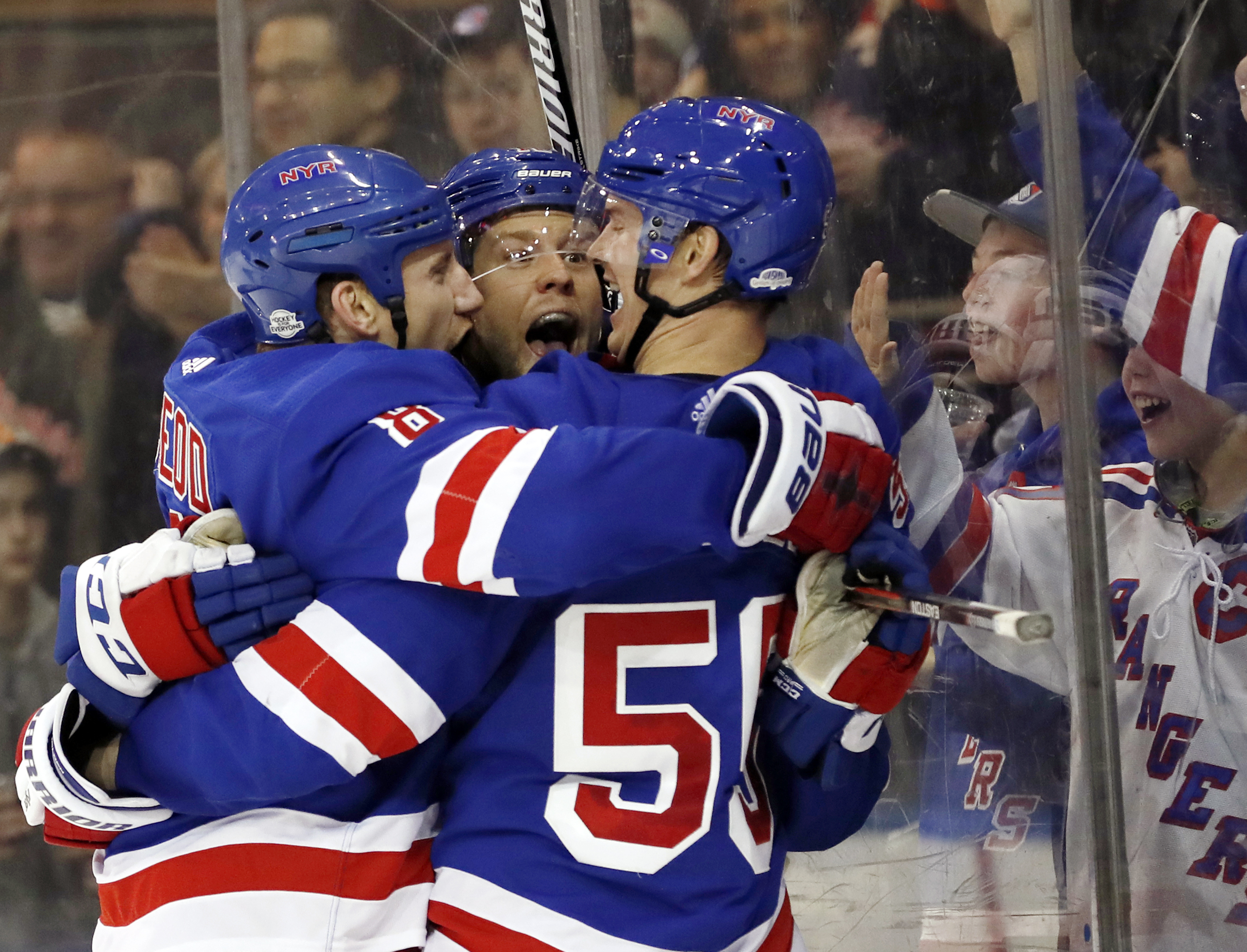 Flyers surge past Rangers 7-4