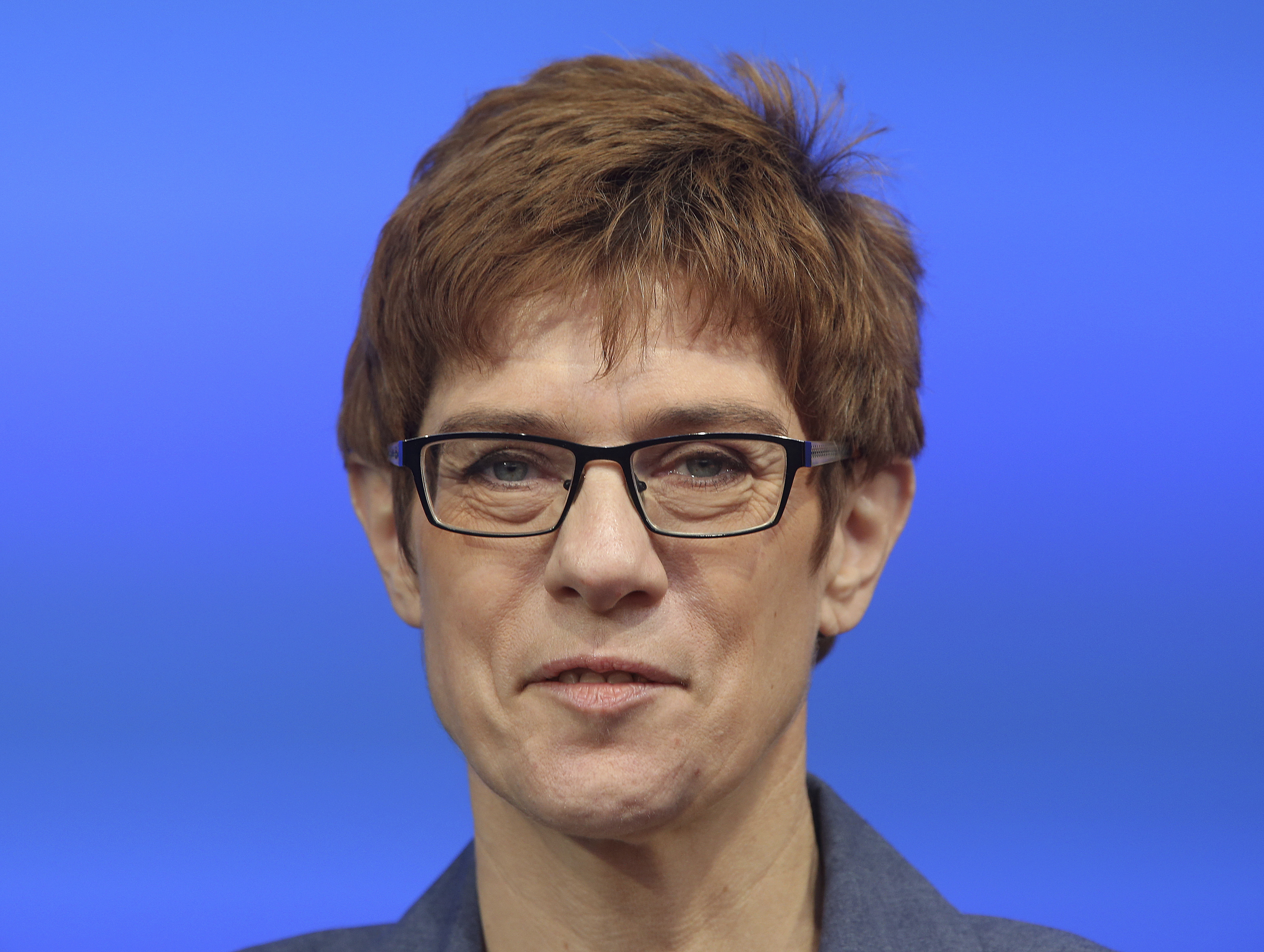 Germany's Merkel brings possible successor to Berlin