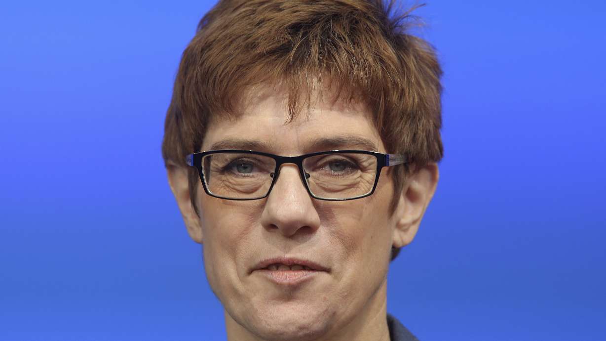 Germany's Merkel brings possible successor to Berlin