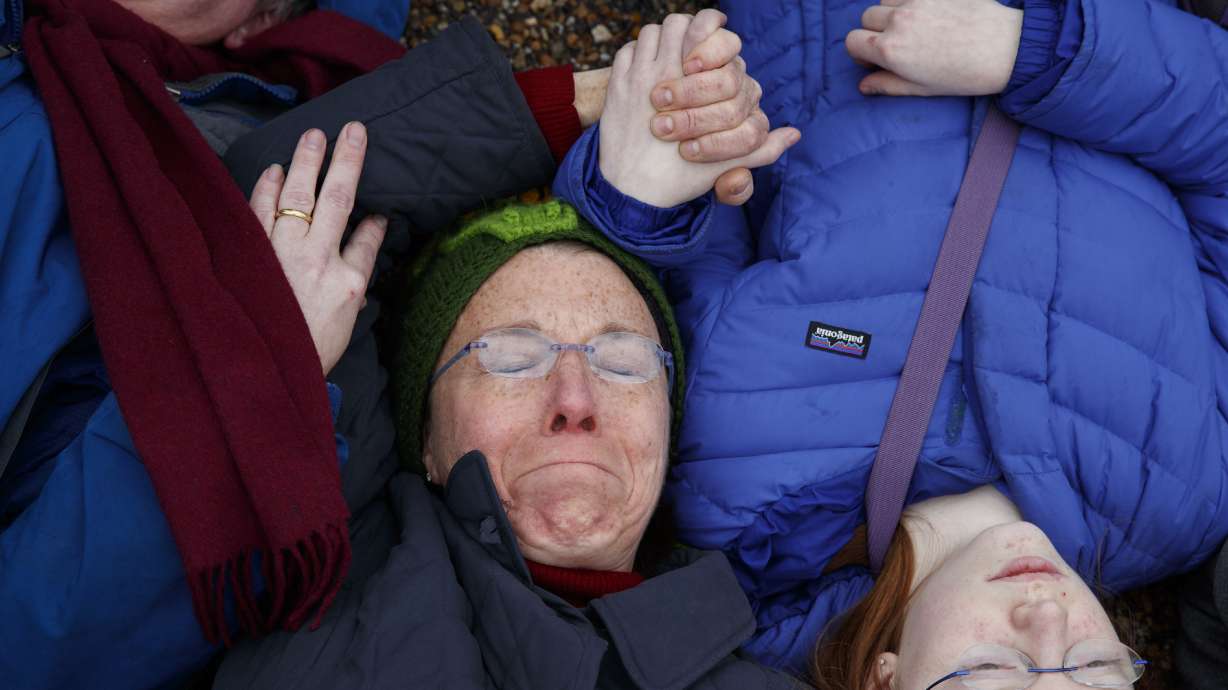 The Latest: Justice Dept to step up review of bump stocks