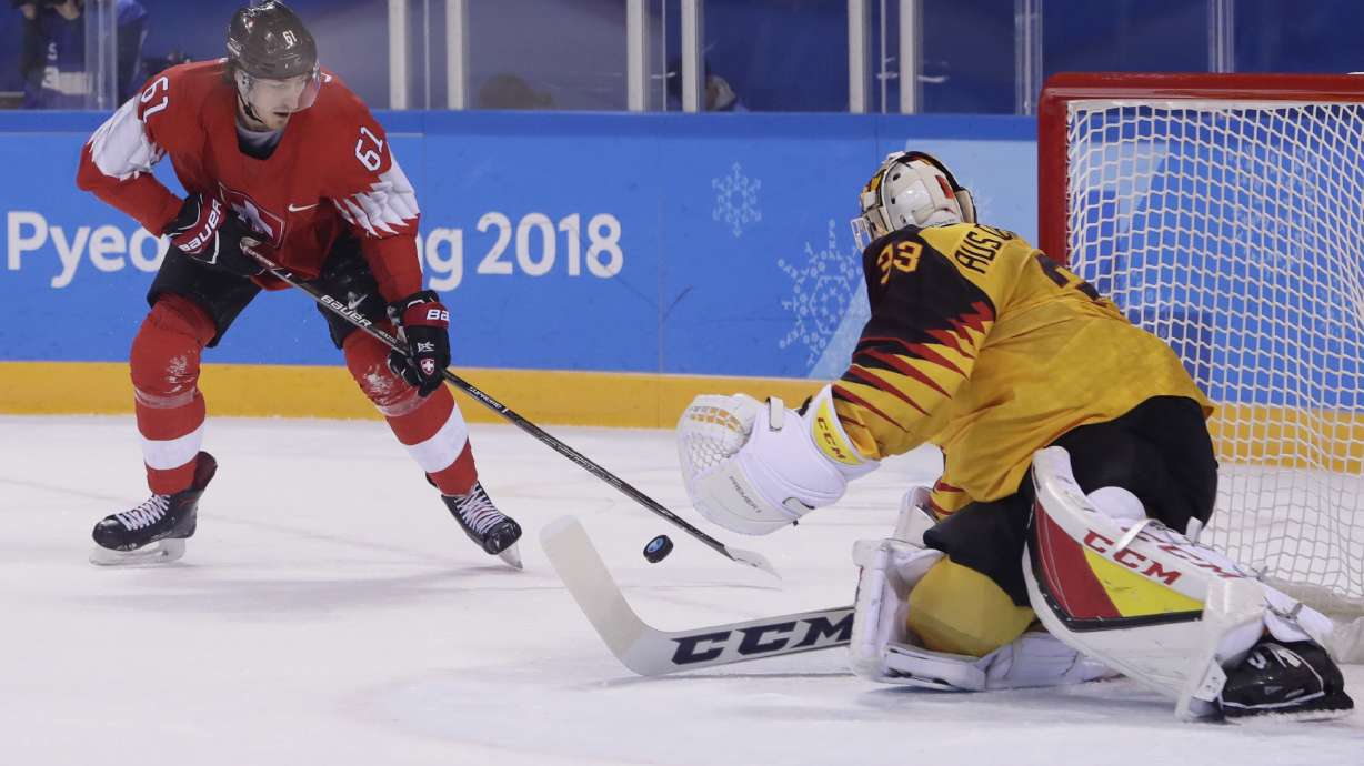 Germany beats Switzerland 2-1 in OT, into Olympic quarters