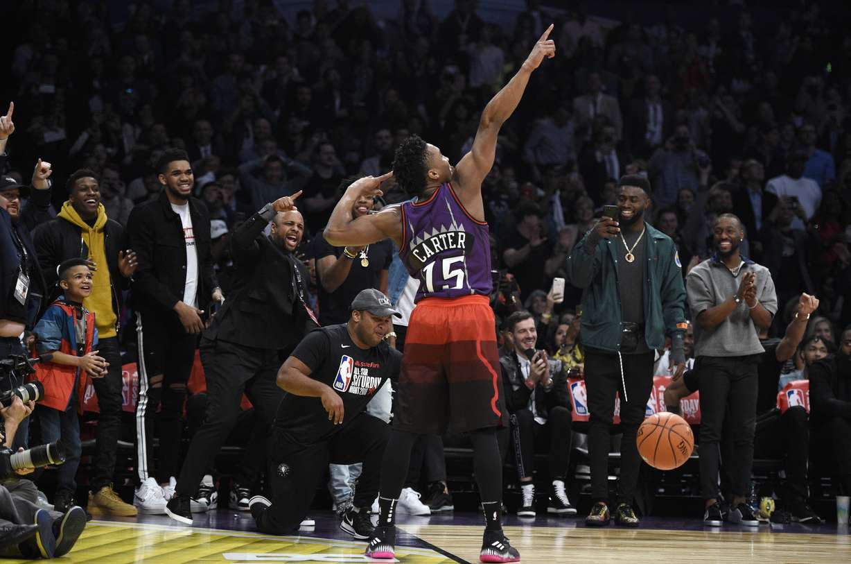 Utah Jazz's Donovan Mitchell gestures after dunking during the NBA All-Star basketball Slam Dunk contest, Saturday, Feb. 17, 2018, in Los Angeles. Mitchell won the event. (Chris Pizzello, AP Photo, File)