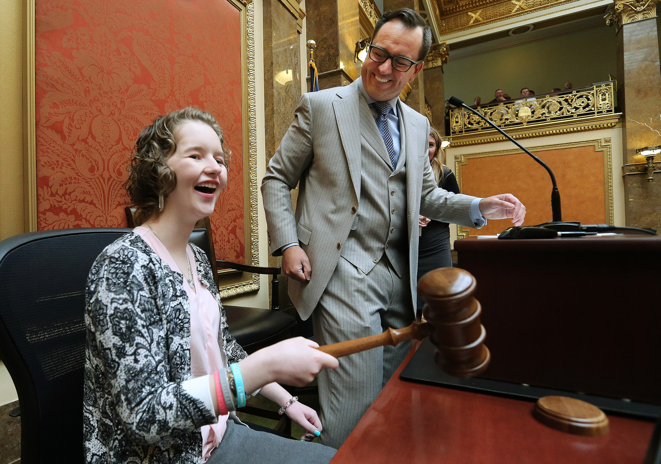 Deserae Turner bangs the gavel to open the Utah House of Representatives as House Speaker Greg Hughes, R-Draper, watches at the Capitol in Salt Lake City on Tuesday, Feb. 20, 2018. Deserae, who also released 25 doves on the front steps of the Capitol as a symbol of hope the future, was enticed to a secluded canal by two teenage boys, where one of them shot her in the back of the head and left her for dead last February. (Photo: Jeffrey D. Allred, KSL)