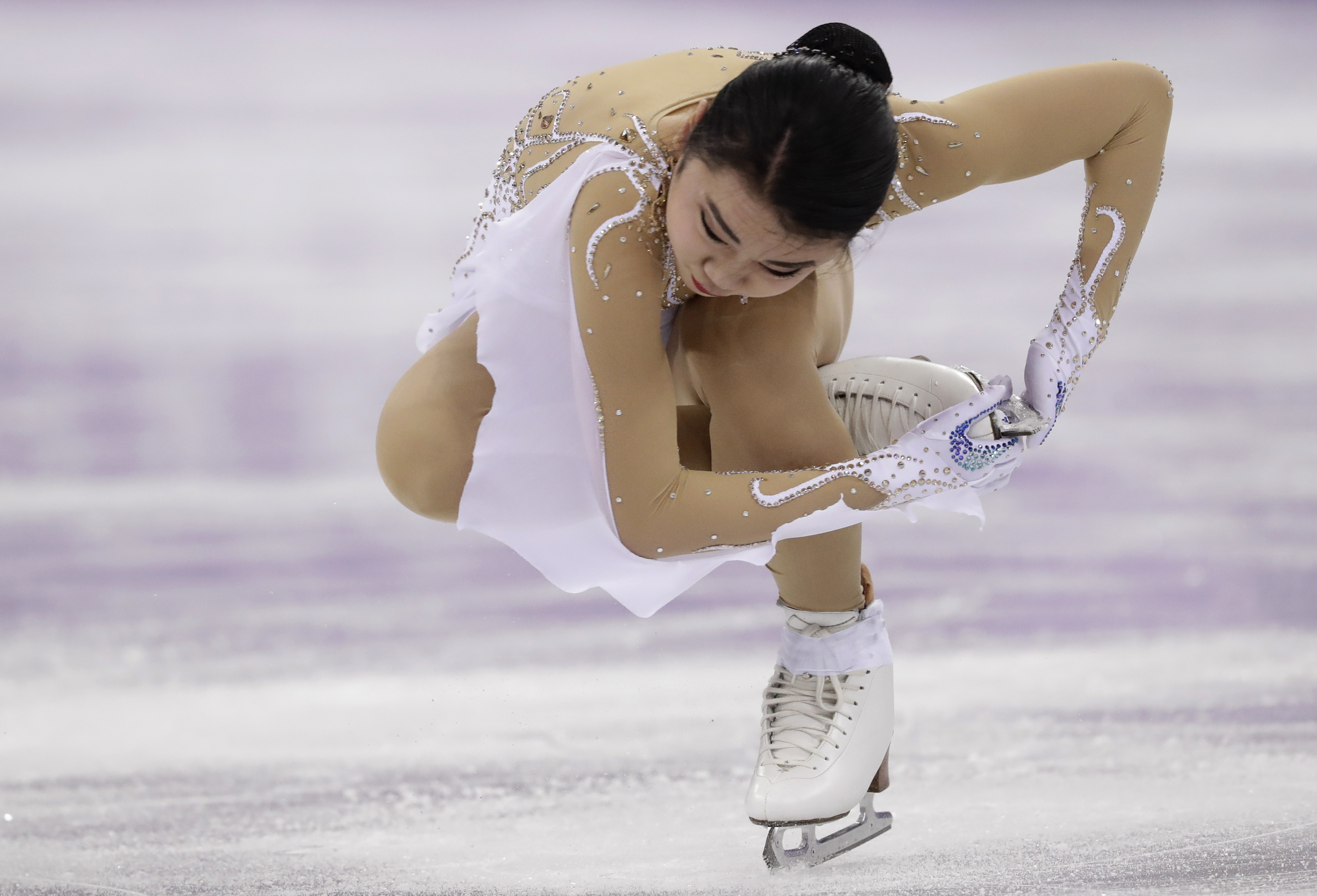 Americans rally after shaky starts in women's short program