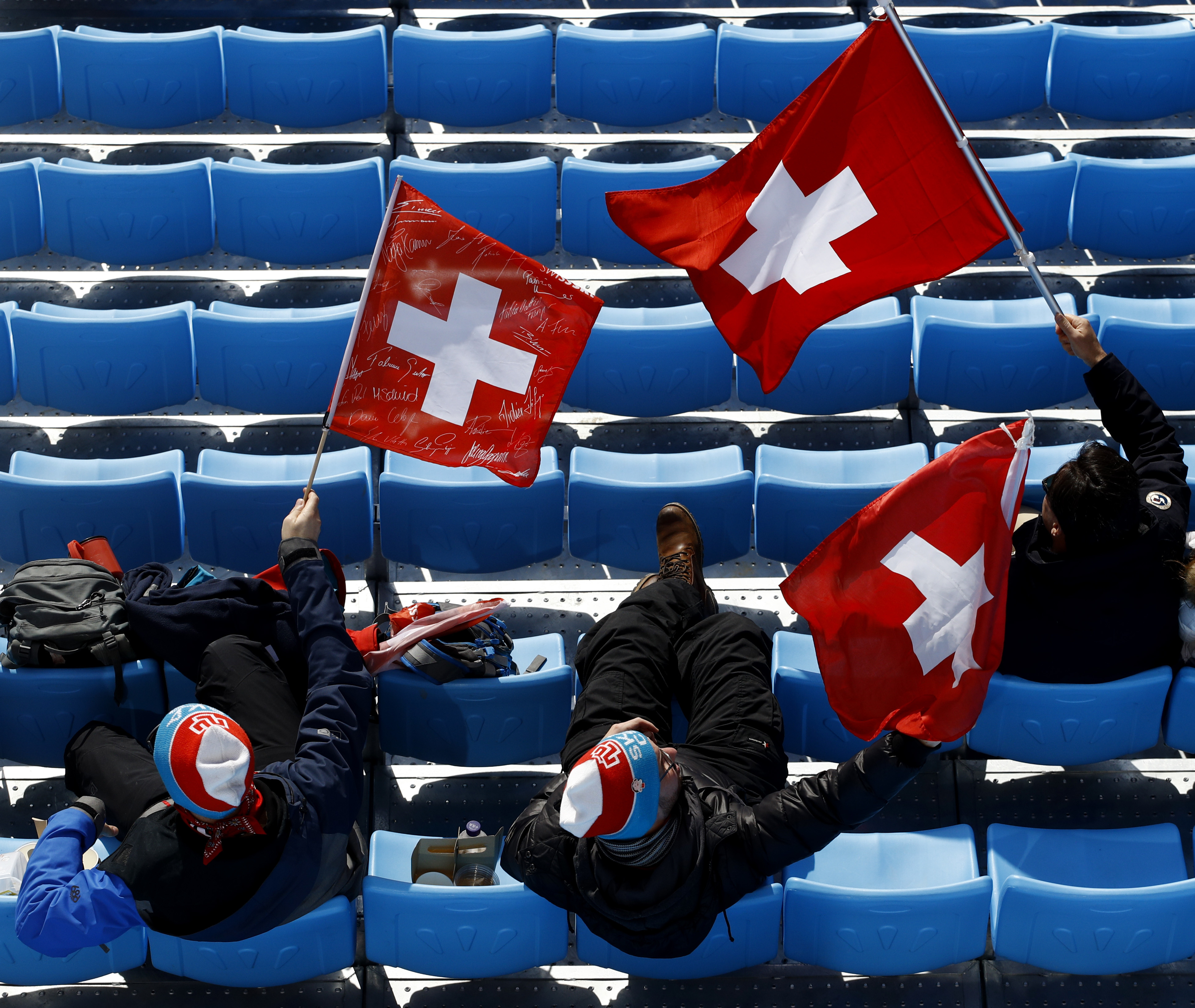 AP PHOTOS: Athletes, fans embrace flags as symbols of pride