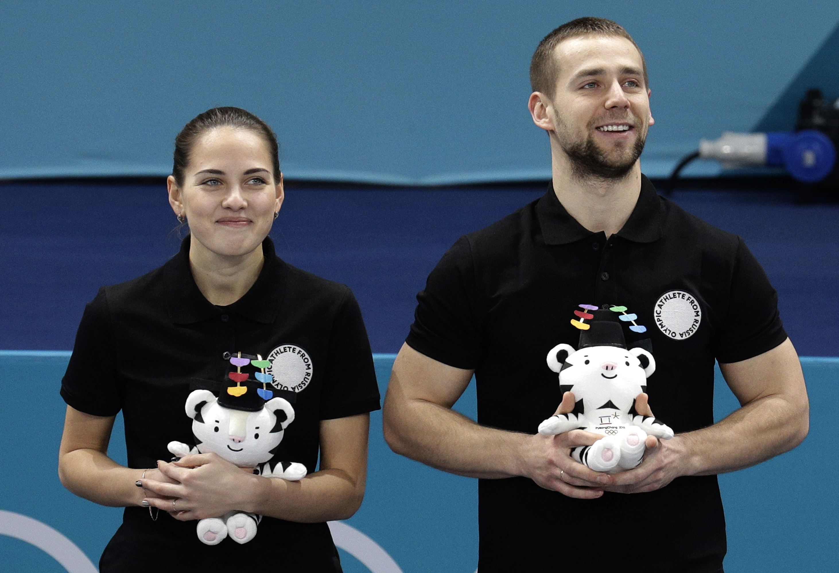 Russian curler stripped of Olympic medal, country pays fee