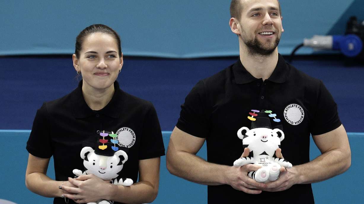 Russian curler stripped of Olympic medal, country pays fee