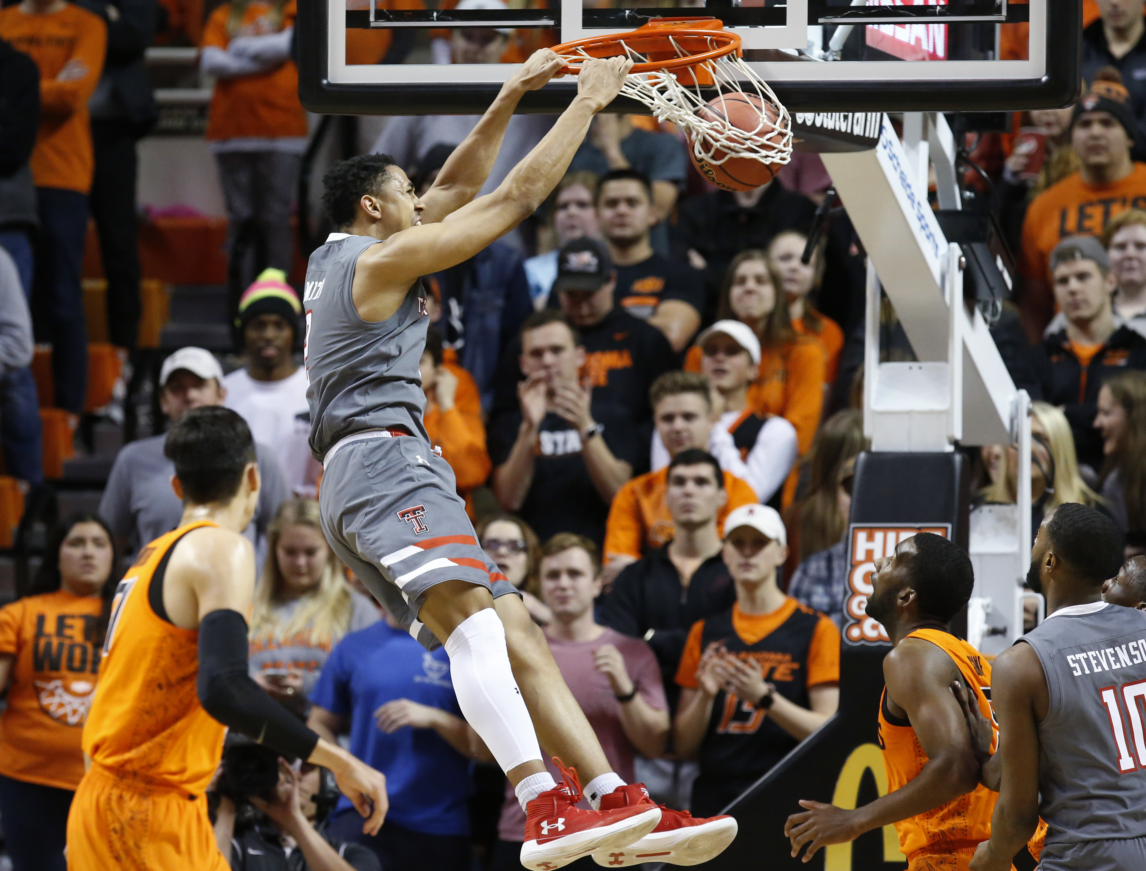 Smith's 21 help Oklahoma State upset No. 6 Texas Tech 79-71