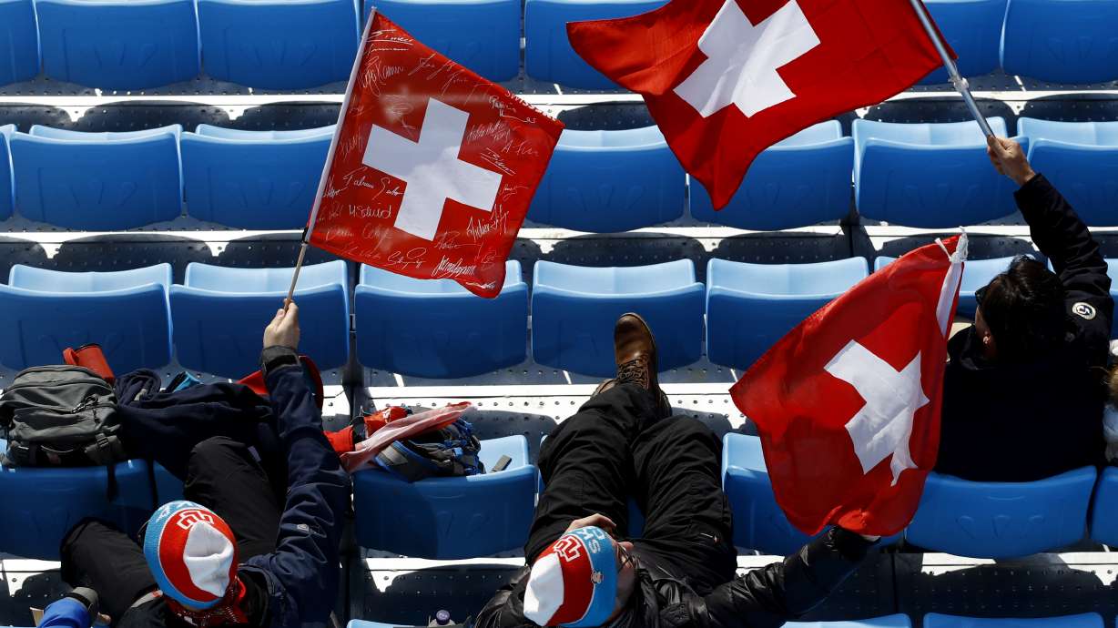 At Olympics, omnipresent flags are a tricky political dance