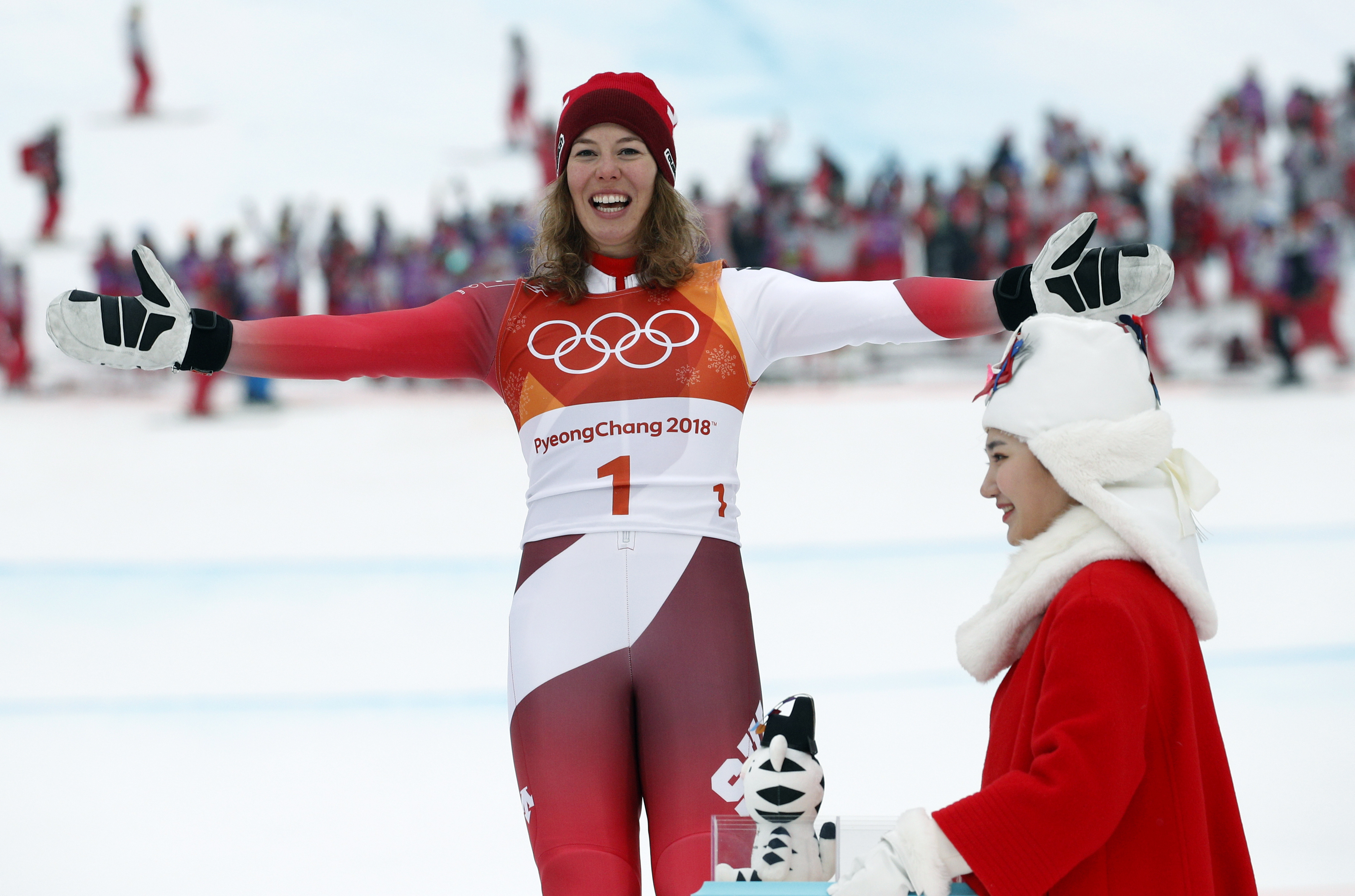 Gisin returns from crash to win gold in Olympic combined
