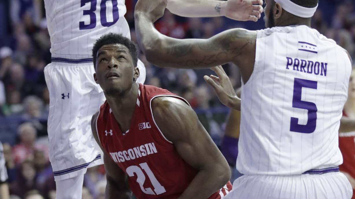 Happ leads Wisconsin past Northwestern, 70-64