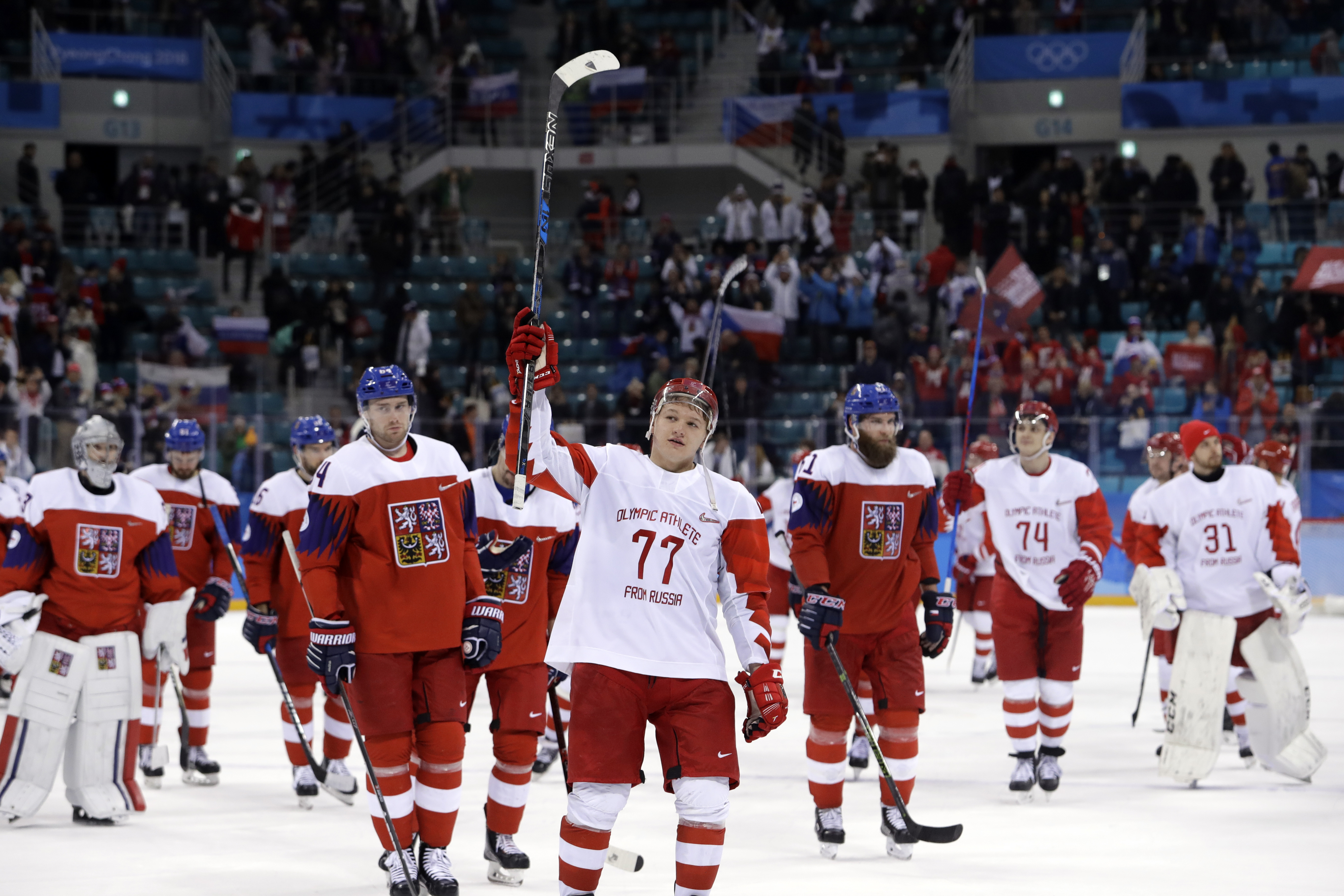 Russians get 1st gold, Germany tops Canada in Olympic hockey