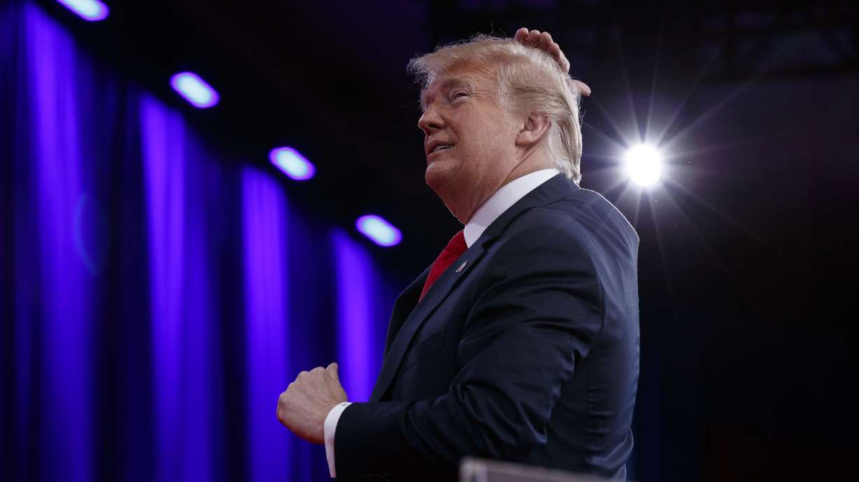 Trump says he goes to great lengths to hide his bald spot