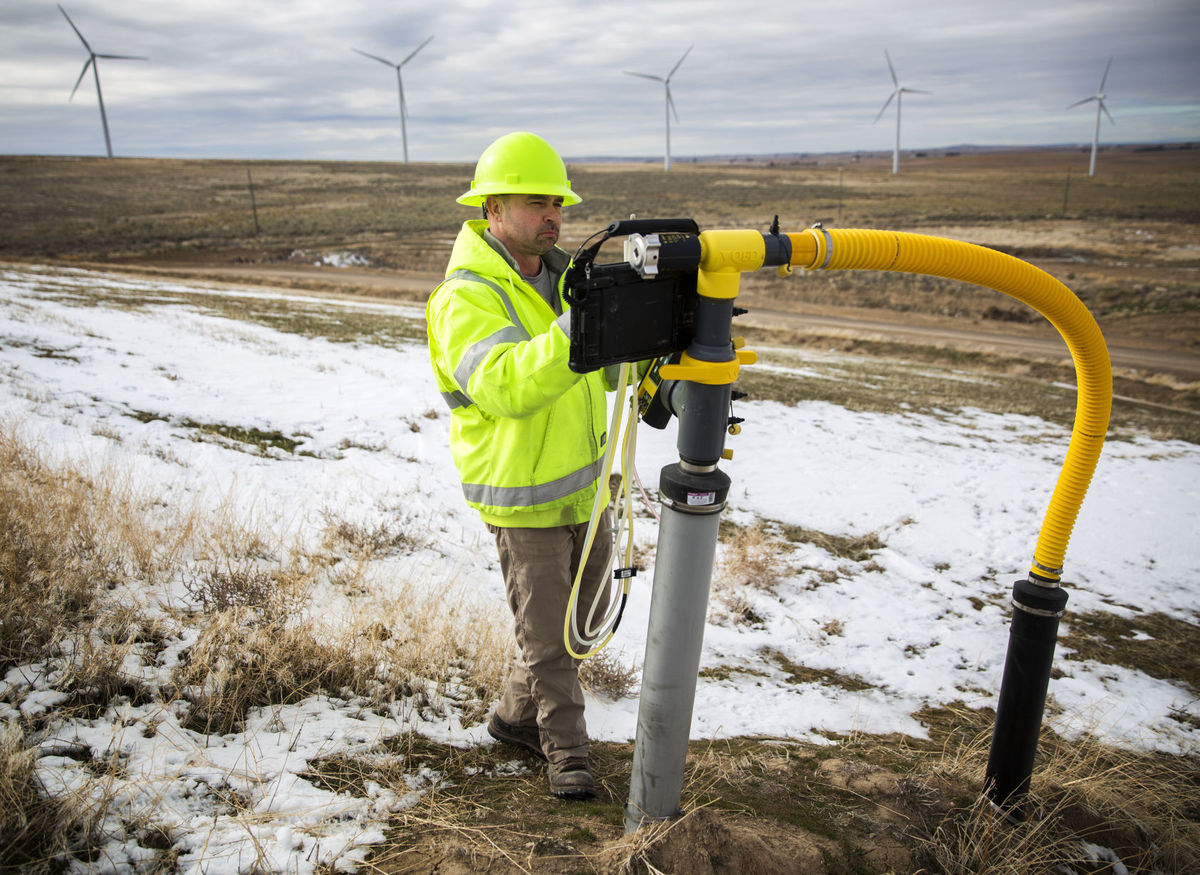 Landfill Gas Specialist Brent Dozier takes a gas reading from a monitoring well Friday at Milner Butte Landfill southwest of Burley. (Photo: Pat Sutphin, Times-News)