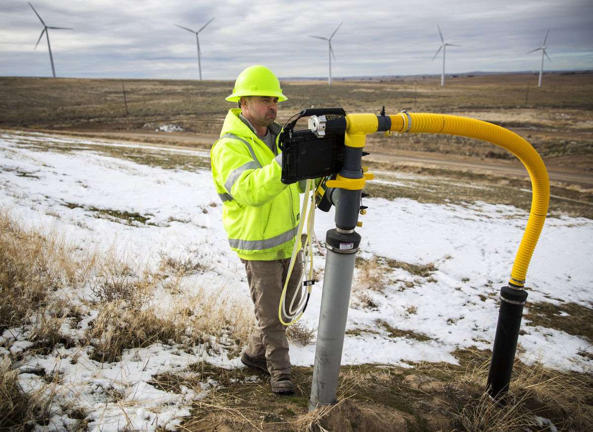 Landfill Gas Specialist Brent Dozier takes a gas reading from a monitoring well Friday at Milner Butte Landfill southwest of Burley. (Photo: Pat Sutphin, Times-News)
