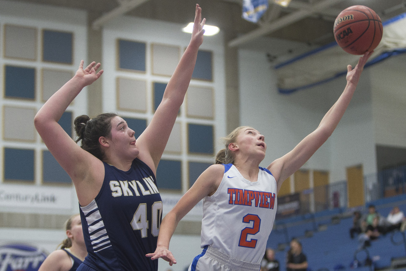 Timpview's Madelyn Boulton puts up a shot while guarded by Skyline's Cameron Mooney during Timpview's 56-49 win over Skyline in the Class 5A state semifinals at Salt Lake Community College in Taylorsville on Friday, Feb. 23, 2018. (Photo: Jacob Wiegand, Deseret News)