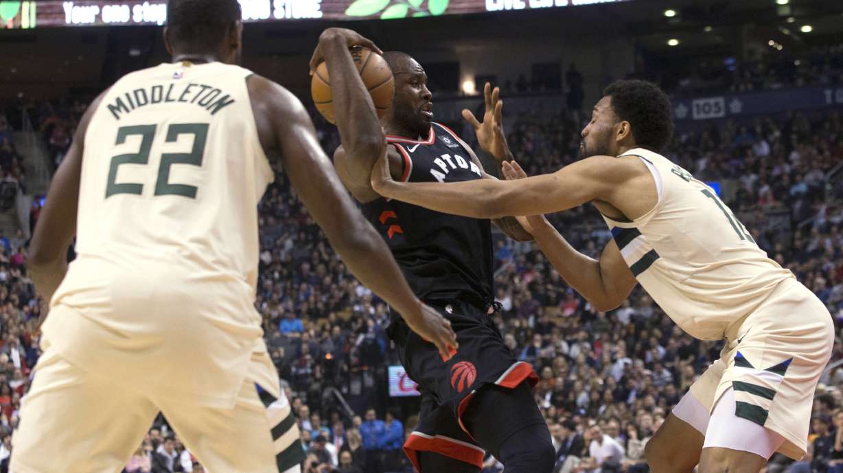Antetokounmpo scores 26, Bucks beat Raptors 122-119 in OT