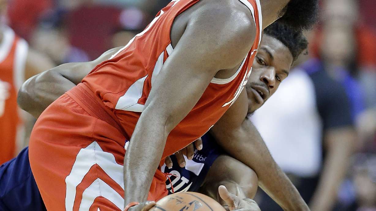 Butler hurt as Rockets beat Wolves for 11th straight win