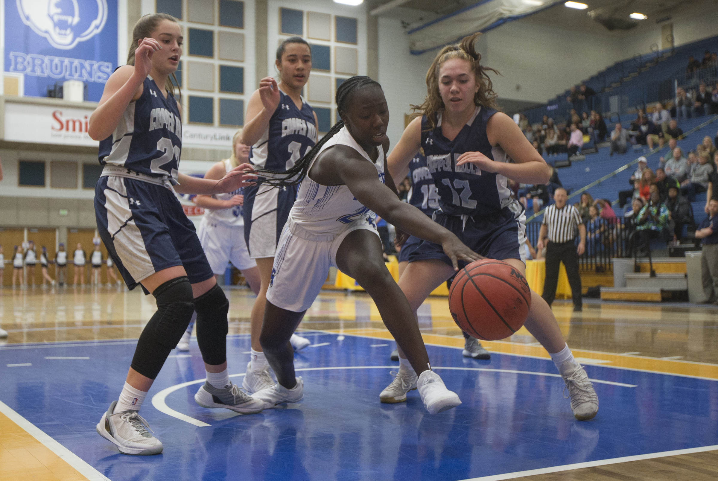 Bingham's Shanyce Makuei attempts to save the ball from going out of bounds during Bingham's 48-40 victory over Copper Hills in the Class 6A state semifinals at Salt Lake Community College in Taylorsville on Friday, Feb. 23, 2018. (Photo: Jacob Wiegand, Deseret News)
