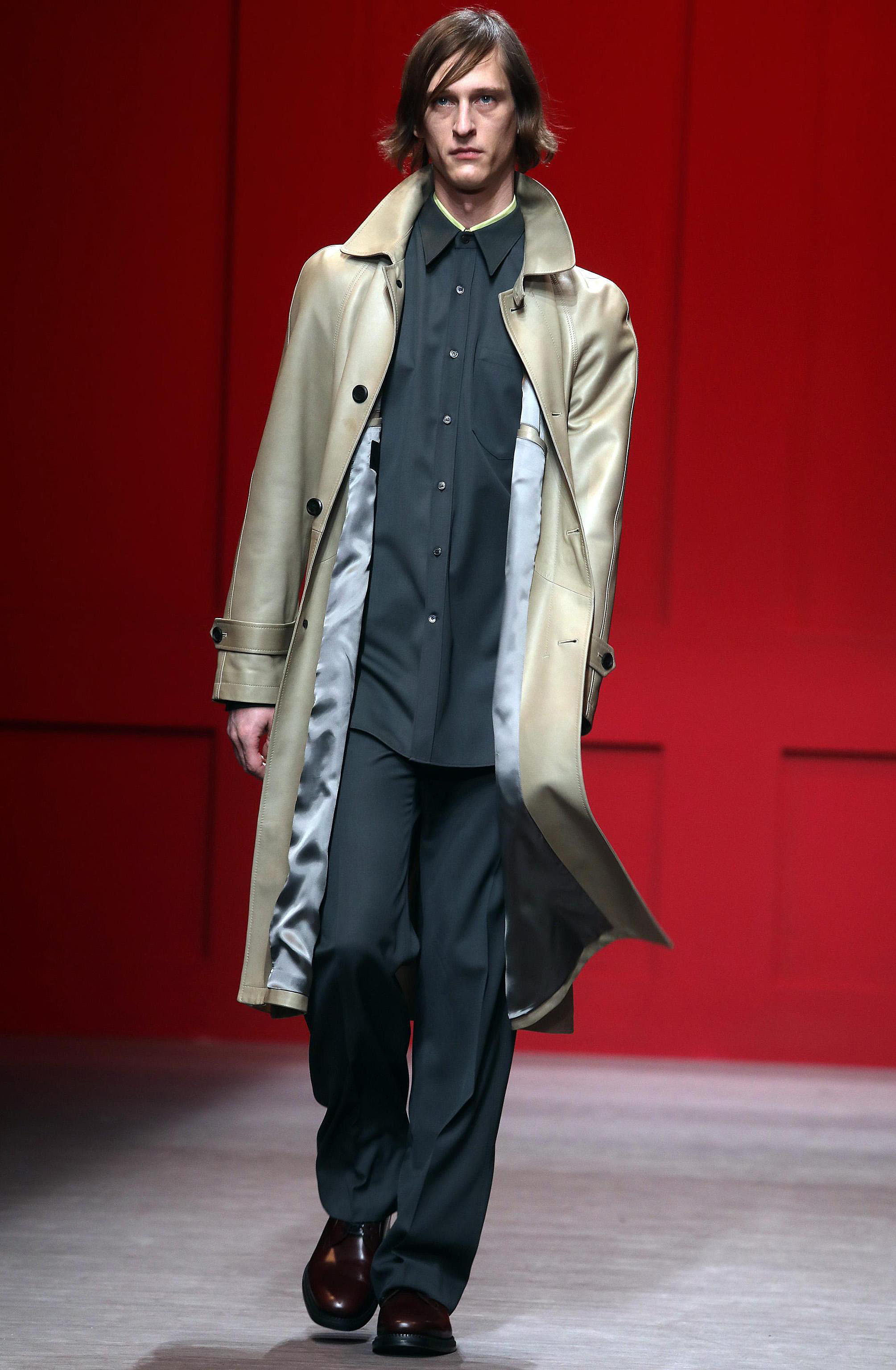 Armani rejects overdone emotion, Ferragamo favors color