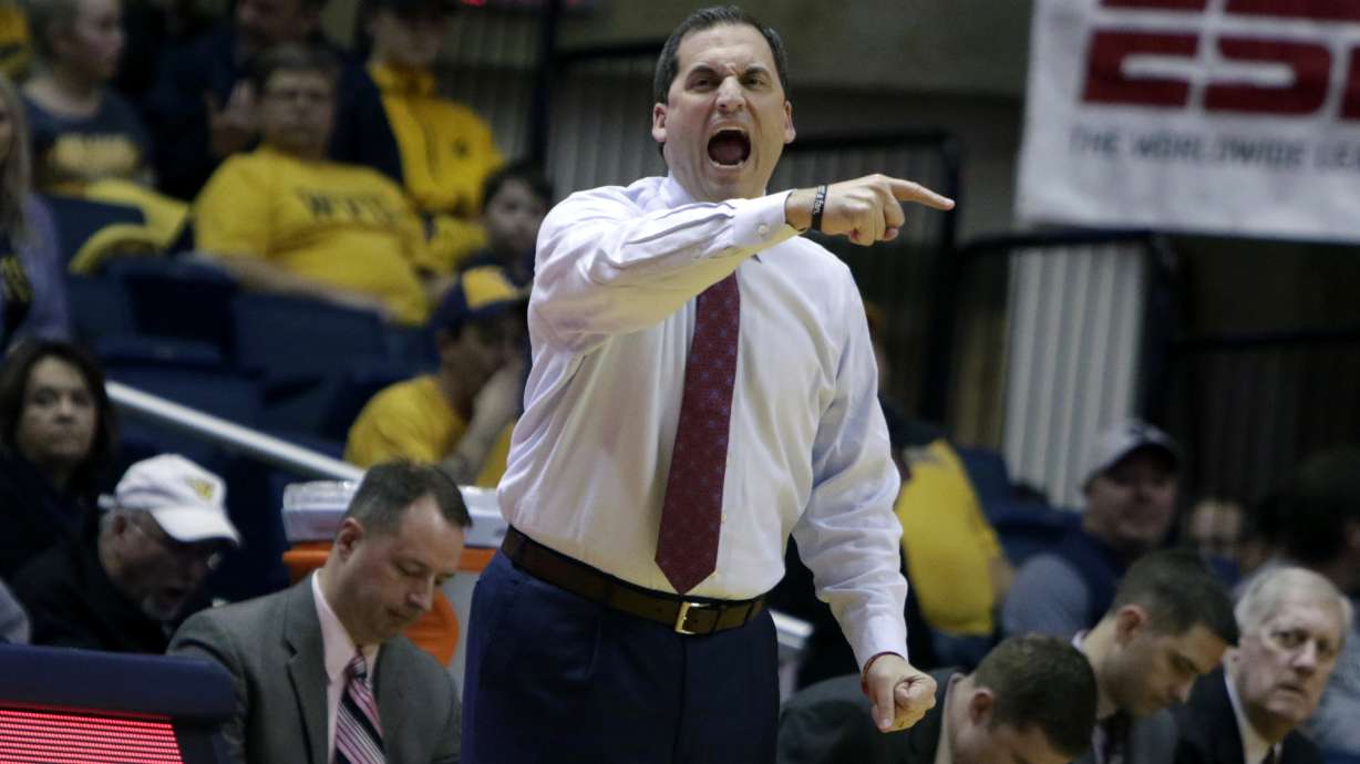 Carter makes history as No. 21 WVU beats Iowa State 85-70