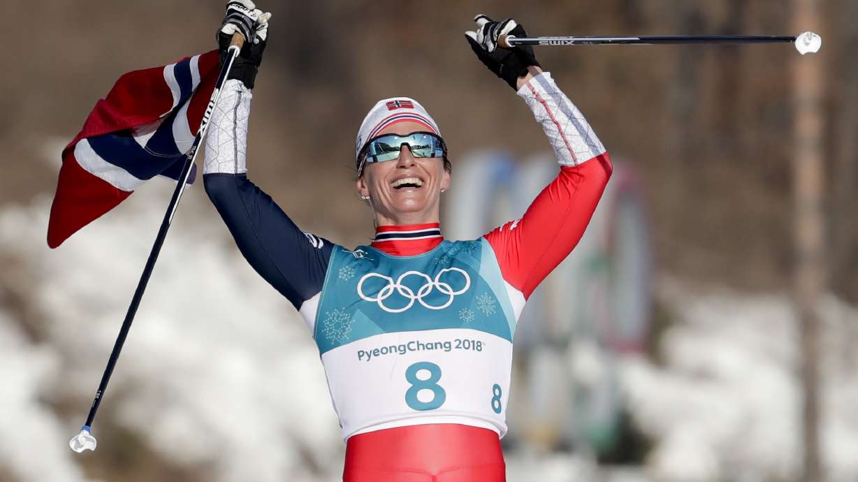 Bjoergen dominates in last Olympic race, wins 5th medal