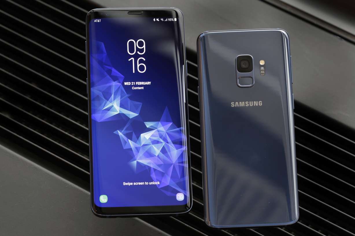 This Wednesday, Feb. 21, 2018, photo shows the Samsung Galaxy S9 Plus, left, and back of a Galaxy S9 mobile phone, during a product preview in New York. The Galaxy S9 phones were unveiled Sunday, Feb. 25, in Barcelona, Spain, and will be available March 16. Advance orders begin this Friday. (AP Photo/Richard Drew)
