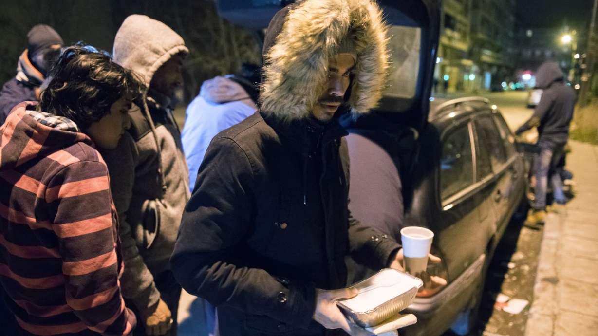 Migrants on stalled route hide in Greek city's ancient walls