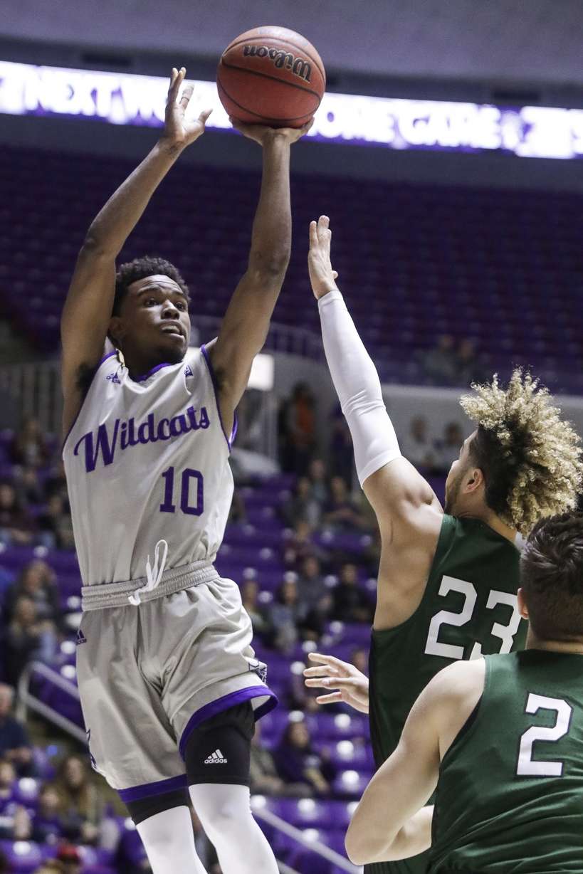 Weber State's Jerrick Harding pulls up to shoot the ball while guarded by Portland State's Holland Woods (23) during the first half of an NCAA college basketball game Saturday, Jan. 20, 2018, in Ogden. (Photo: Matt Herp, Standard-Examiner via AP Photo)