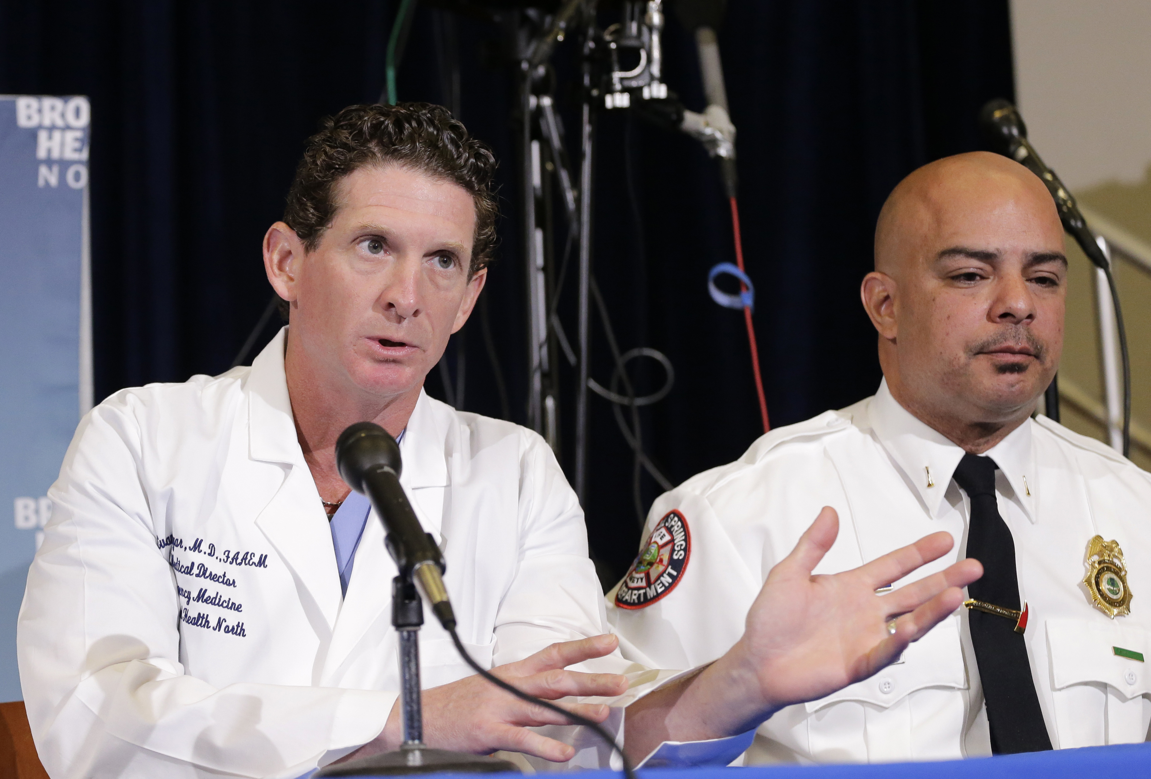 Dr. Evan Boyar, Medical Director of Emergency Services, left, speaks to the media during a press conference regarding Marjory Stoneman Douglas High School shooting survivor Maddy Wilford, at Broward Health North in Deerfield Beach, Fla., Monday, Feb. 26, 2018. (Terry Renna, AP Photo)