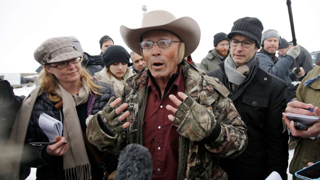 Judge keeps 5 charges against FBI agent accused of lying