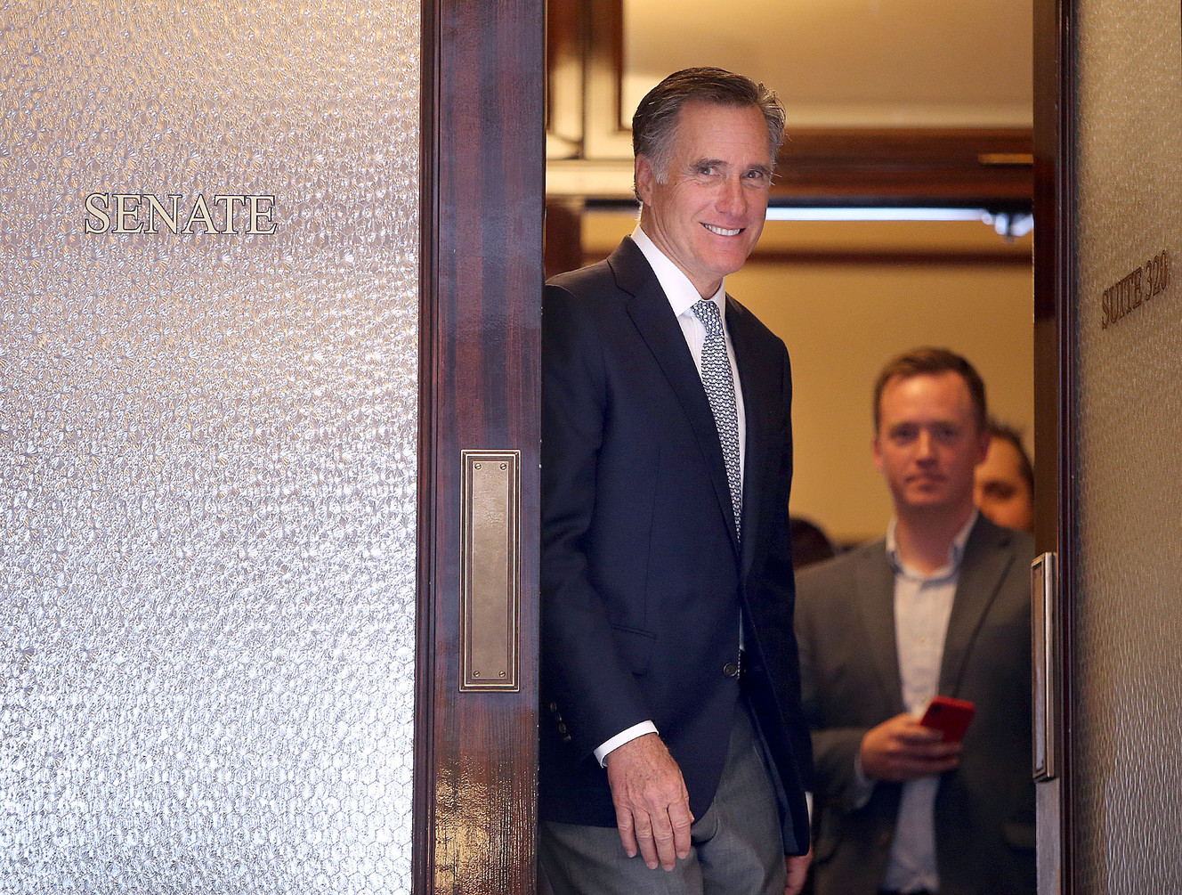 Mitt Romney approaches members of the media after addressing House and Senate Republicans during their caucus lunch meetings at the Capitol in Salt Lake City on Tuesday, Feb. 27, 2018. (Photo: Kristin Murphy, KSL)
