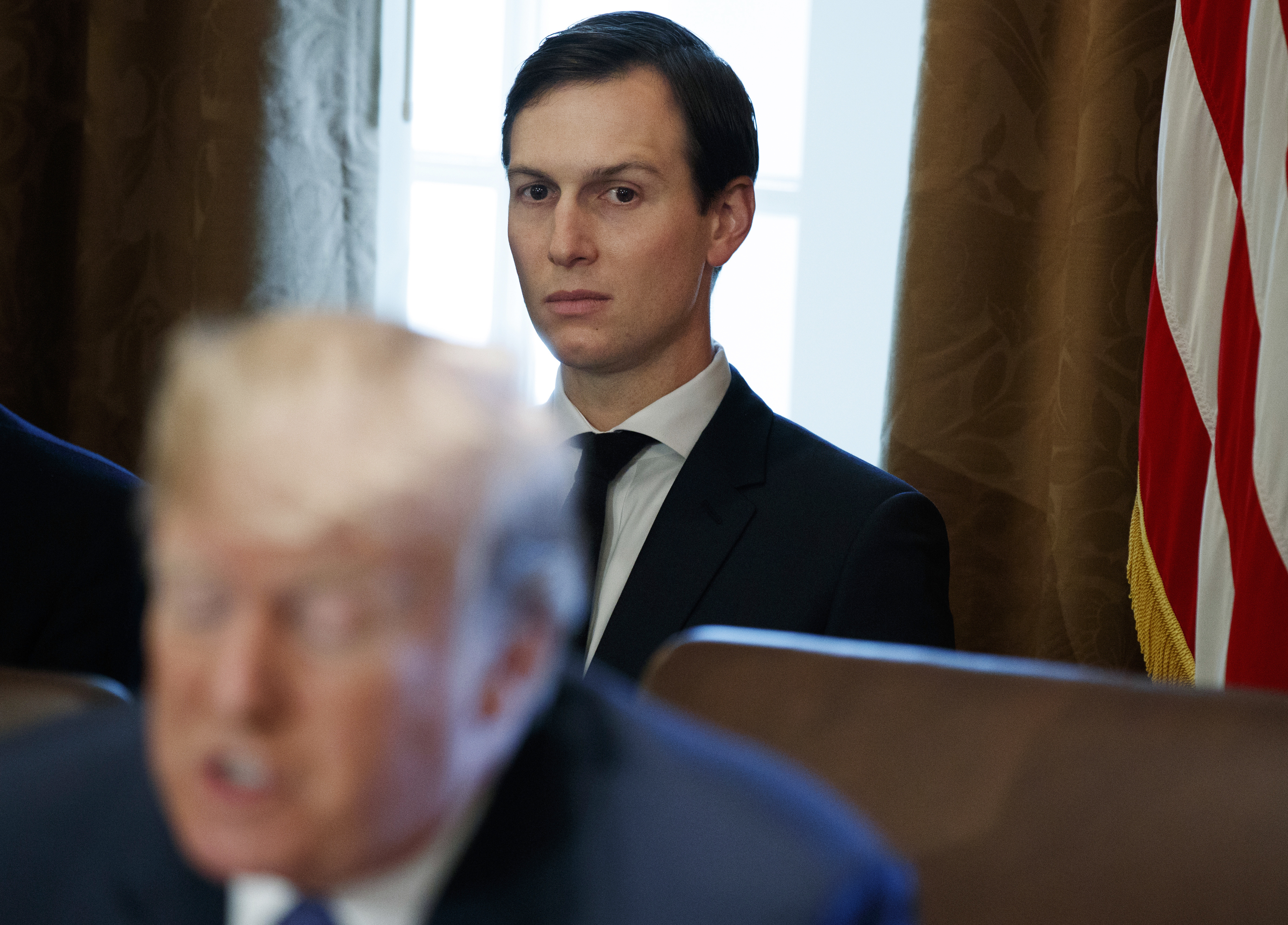 Kushner security status reduced, cutting access to secrets